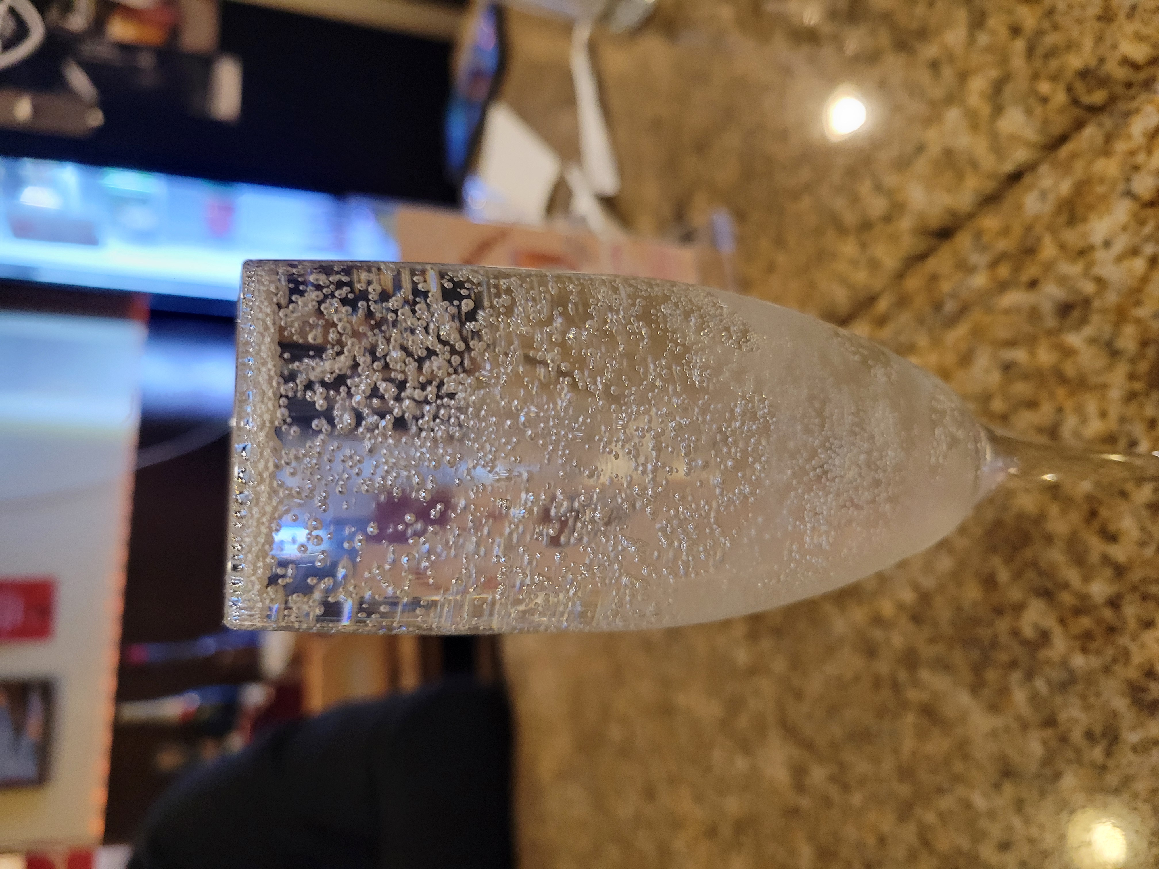 Sparkling sake jelly in a champagne glass.